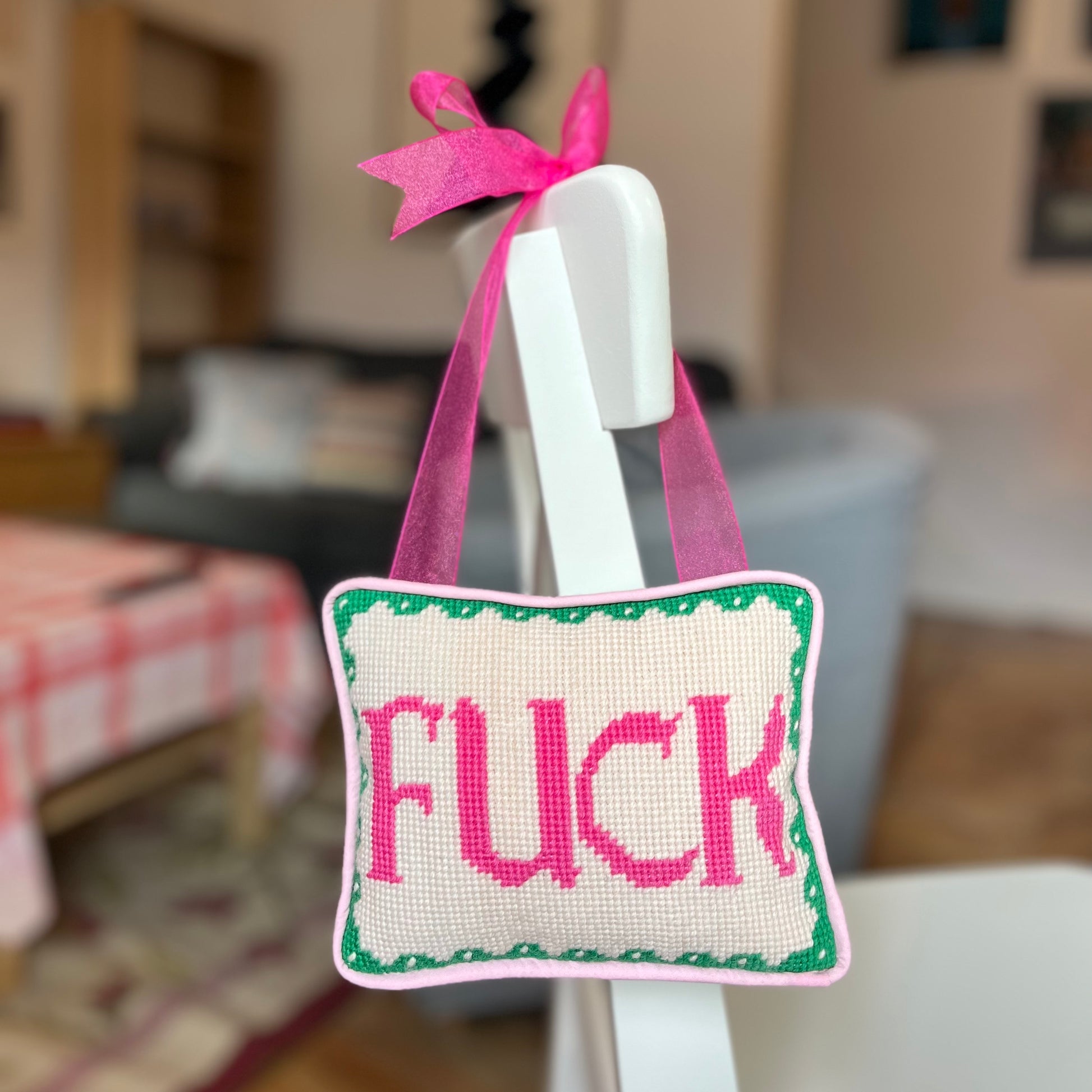 ‘FUCK’ hanging pillow